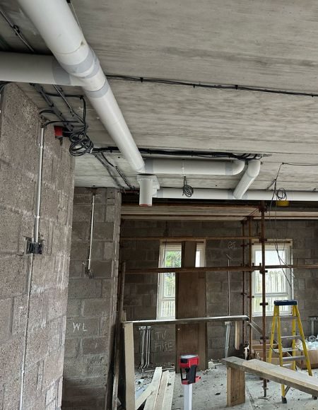 House at first fix stage with mvhr ducting and electrics installed