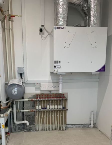 MVHR unit installed in plant room of new build home