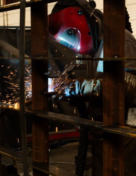 Welder welding with on torch extraction