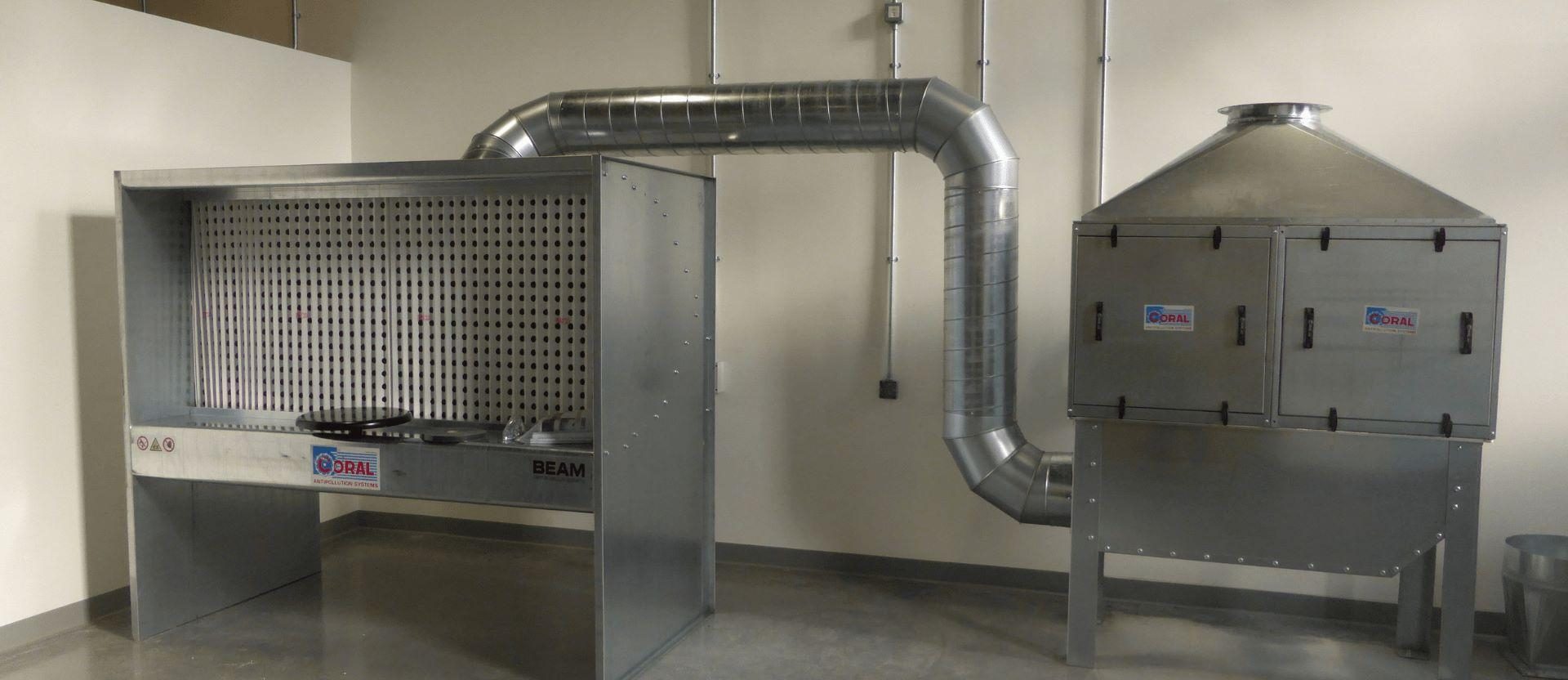 Extraction system for spraying