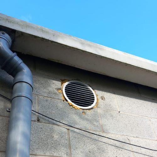 Supply air ventilation grille installed outside building