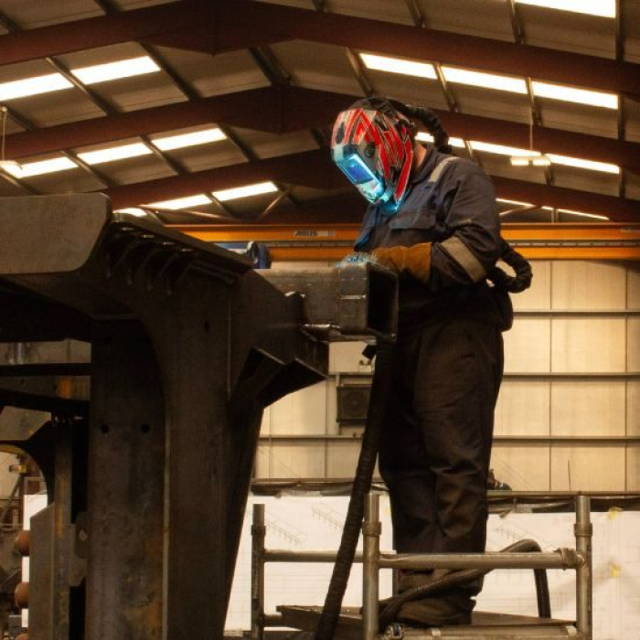 DMAC Engineering welder using BEAM on torch extraction system while welding
